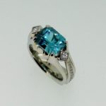 Horizontal Set Radiant Cut Blue Zircon and Diamond Ring - Dyke Vandenburgh Jewelers