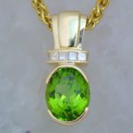Pendant with Semi Bezel Set Oval Peridot with Channel Set Princess Cut Diamonds - Dyke Vandenburgh Jewelers