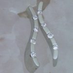 Soft Curve Semi Bezel Set Diamond Earrings - Dyke Vandenburgh Jewelers