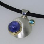 Sterling Silver and Yellow Gold Orbit Pendant with Tanzanite and Blue Zircon - Dyke Vandenburgh Jewelers
