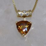 Yellow Gold Triangle Sphene Pendant with Diamond Barrel Bail - Dyke Vandenburgh Jewelers